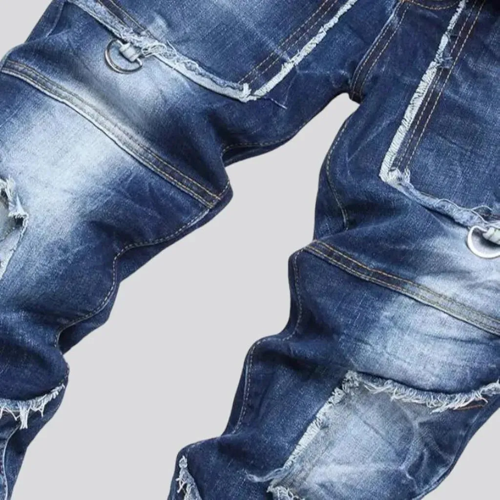 Damaged men's mid-waisted jeans