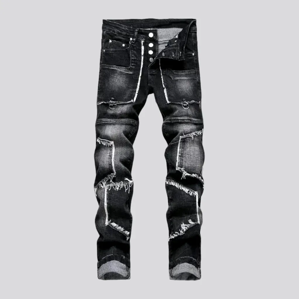 Damaged men's mid-waisted jeans