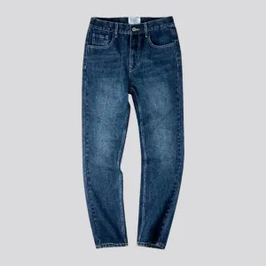 Stonewashed back-cinch tapered men's jeans