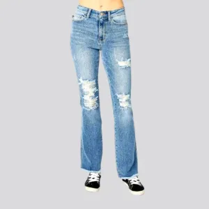 Whiskered women's distressed jeans